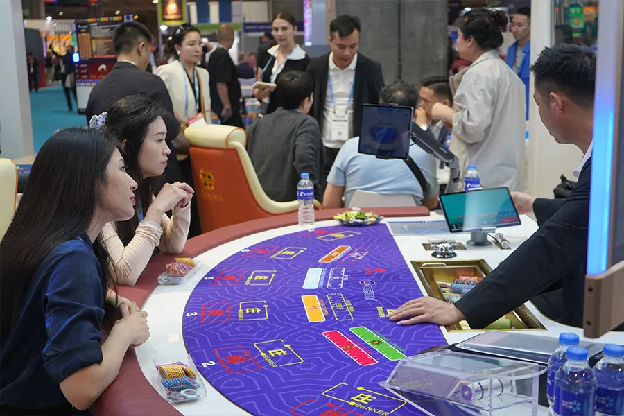 Customer photos from the 2026 G2E ASIA CTS exhibition booth